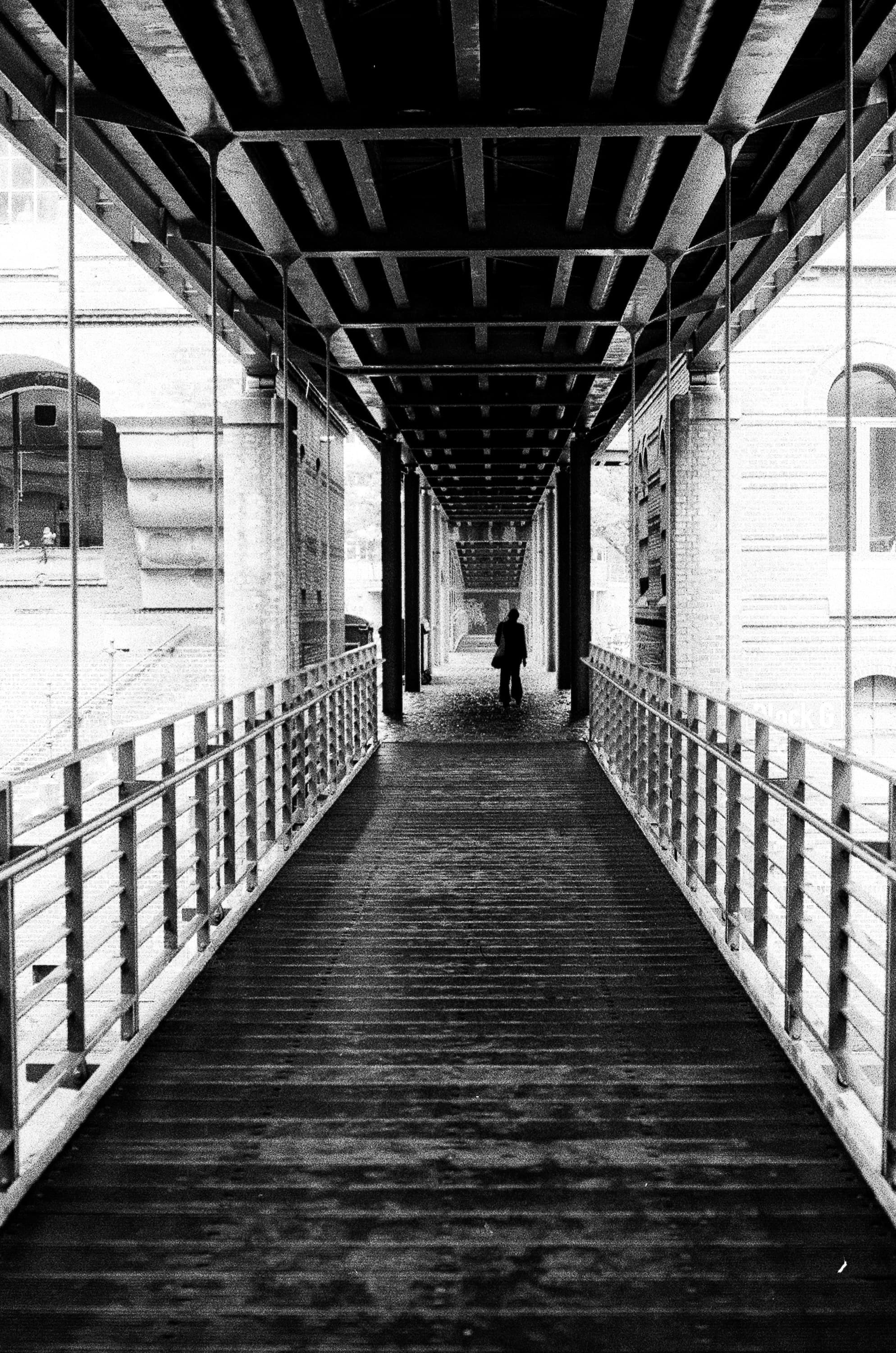 Hamburg docks bridge with lone figure